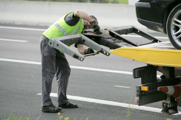 packing up the tow truck  