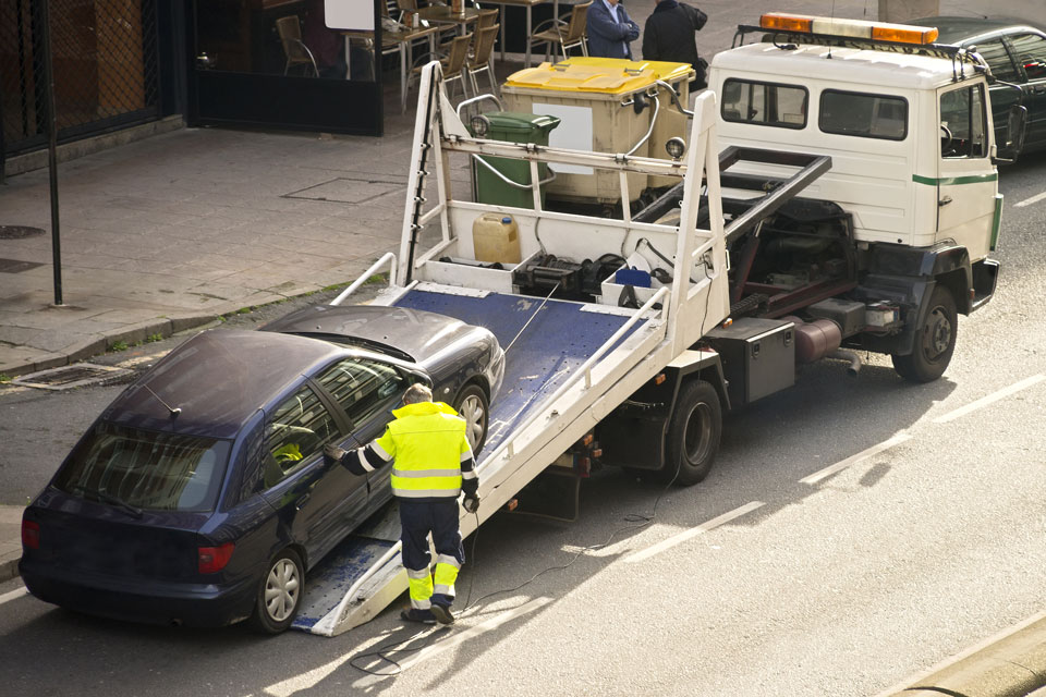 Towing truck car wrecker in city