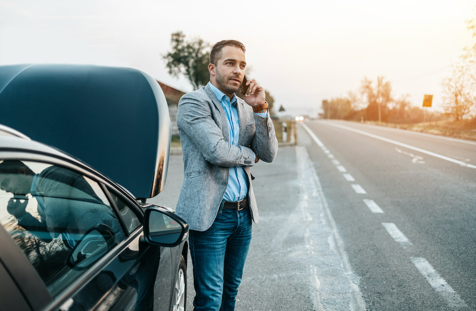 Relieved roadside assistance customer on the phone to Fast Melbourne Towing.