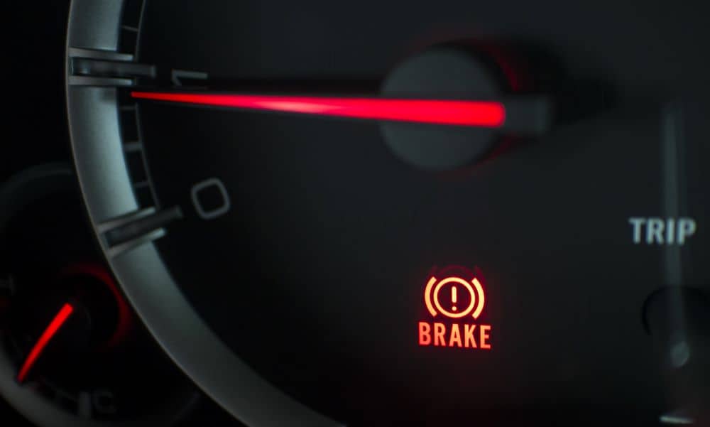 Dashboard showing brake warning light. 