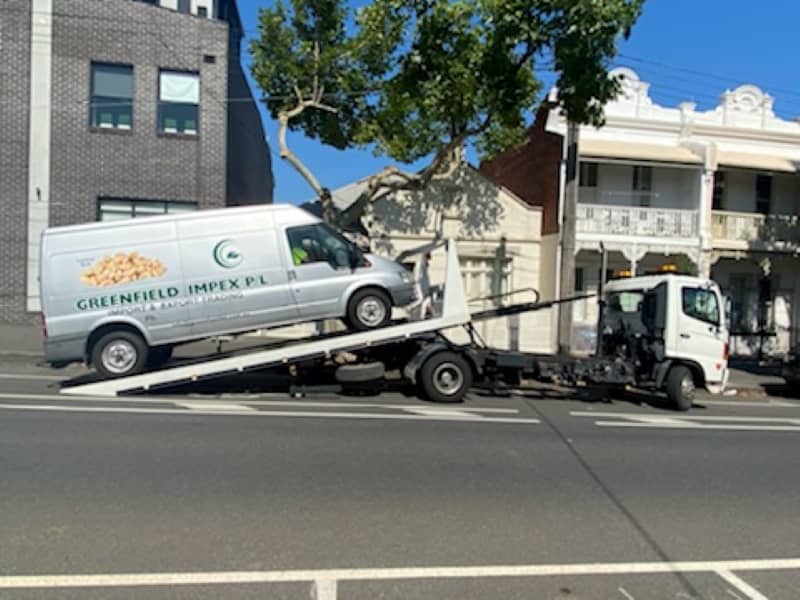 A van being towed.