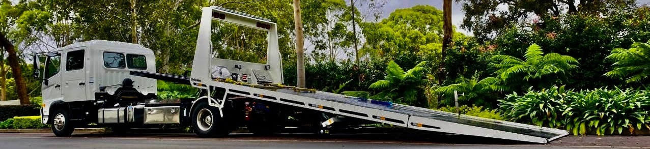 A tilt tray tow truck ready to start servicing the Melbourne area in Victoria.