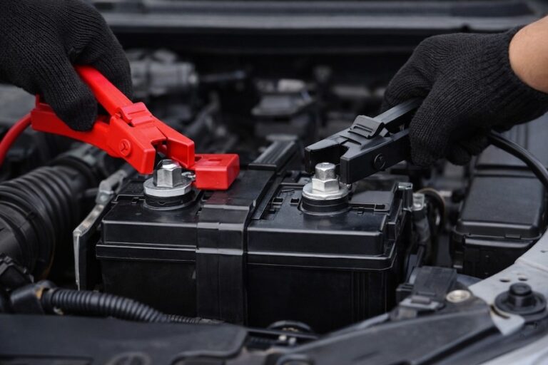 Connecting jumper cables to jump start a car battery safely in Melbourne